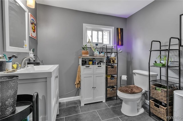 547 Potomac Ave, Buffalo, NY 14222 - bathroom featuring tile patterned flooring, vanity, and toilet