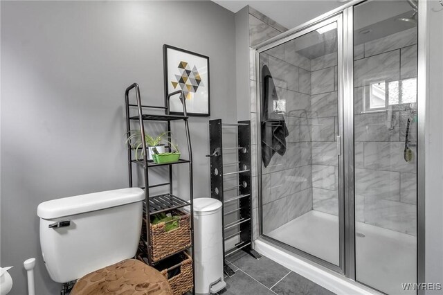 547 Potomac Ave, Buffalo, NY 14222 - bathroom with tile patterned flooring, toilet, and walk in shower