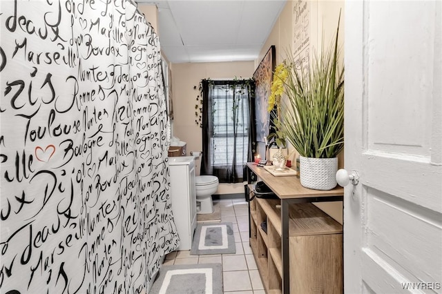 547 Potomac Ave, Buffalo, NY 14222 - bathroom featuring tile patterned floors, toilet, and a shower with shower curtain