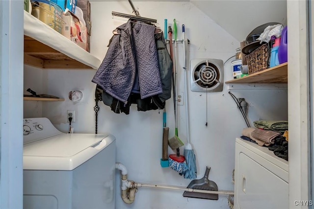 laundry room featuring washing machine and dryer