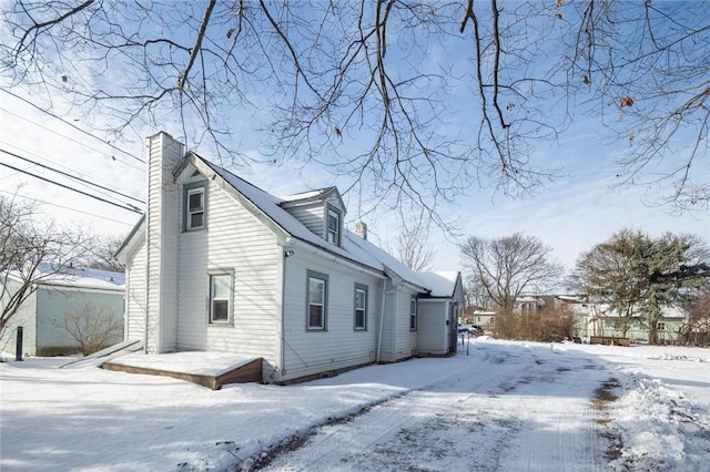 view of snow covered property