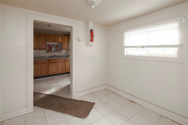 view of tiled empty room