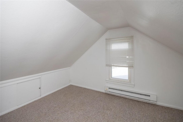 bonus room with lofted ceiling, carpet flooring, and baseboard heating