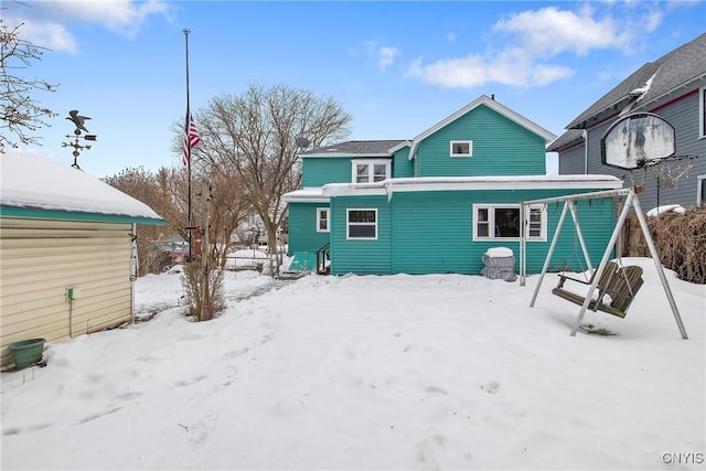 view of snow covered house