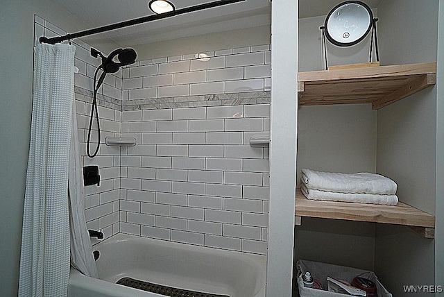 bathroom with shower / bath combination with curtain