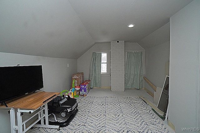 playroom with lofted ceiling