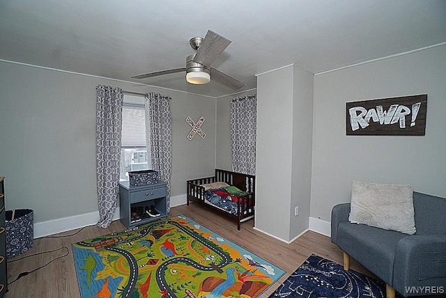 interior space with hardwood / wood-style flooring and ceiling fan