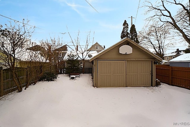 view of snow covered garage