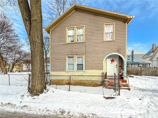 view of snow covered property