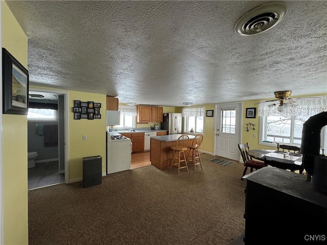 interior space with a healthy amount of sunlight and a textured ceiling