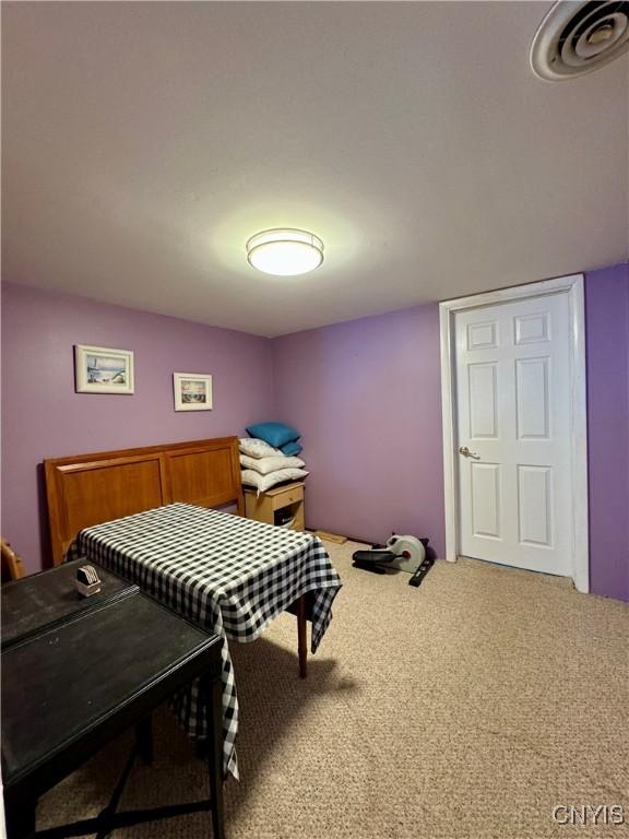 bedroom featuring carpet flooring