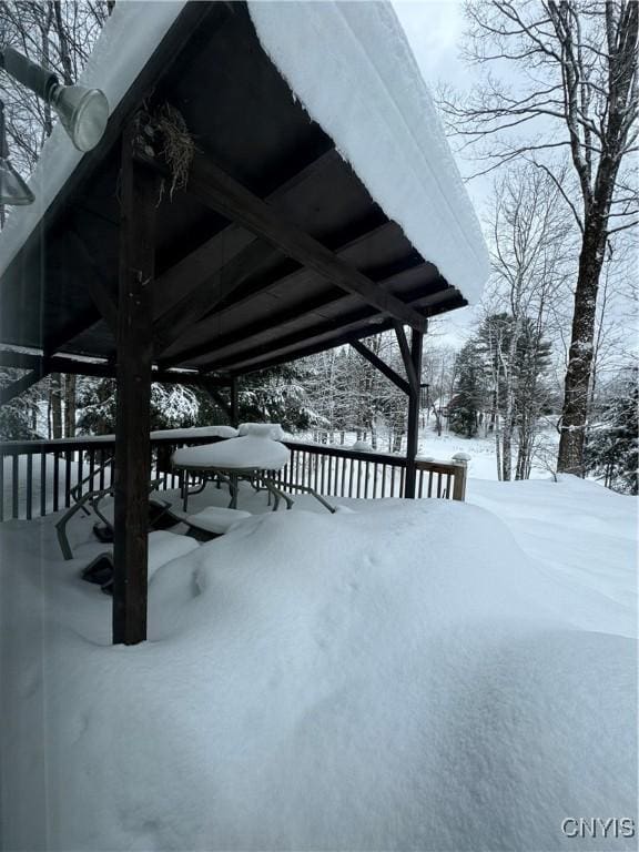 view of snow covered deck