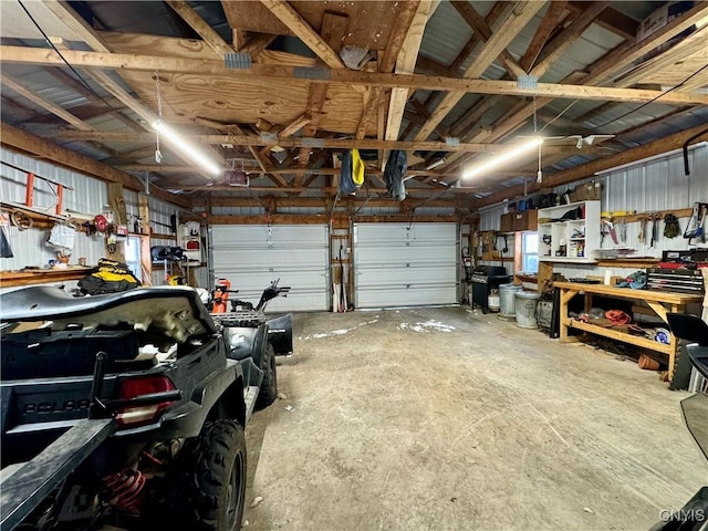 garage with a workshop area