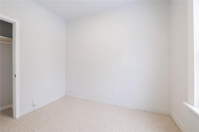 unfurnished bedroom with carpet floors