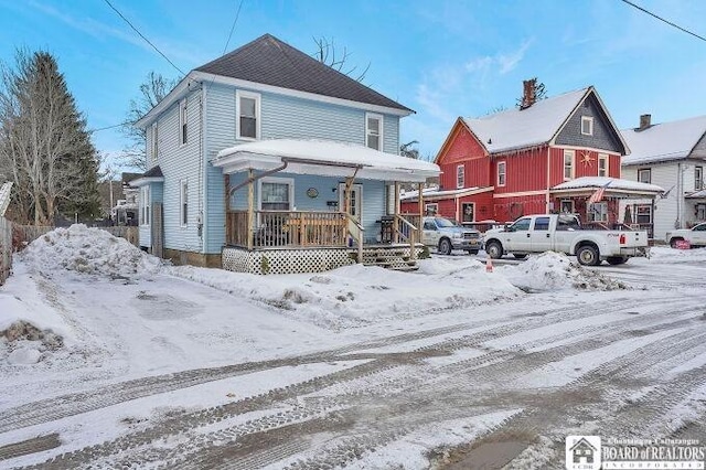 front of property featuring a porch