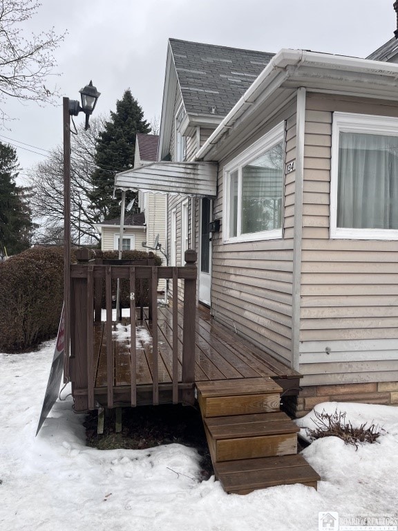 view of snow covered deck