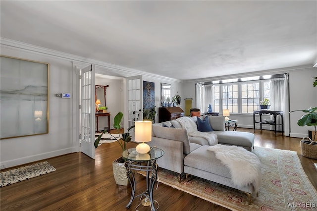 living room with dark wood-type flooring, crown molding, french doors, and a wealth of natural light