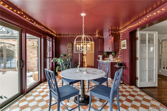 dining area with a notable chandelier