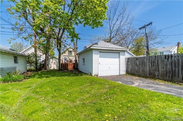 garage with a lawn