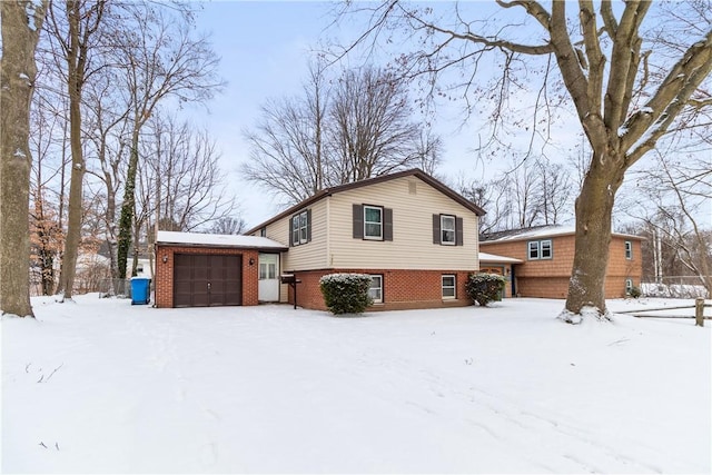 split level home with a garage