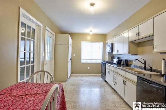 kitchen with gas range, dishwasher, sink, and white cabinets