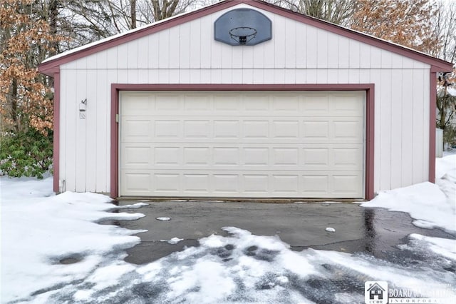 view of snow covered garage