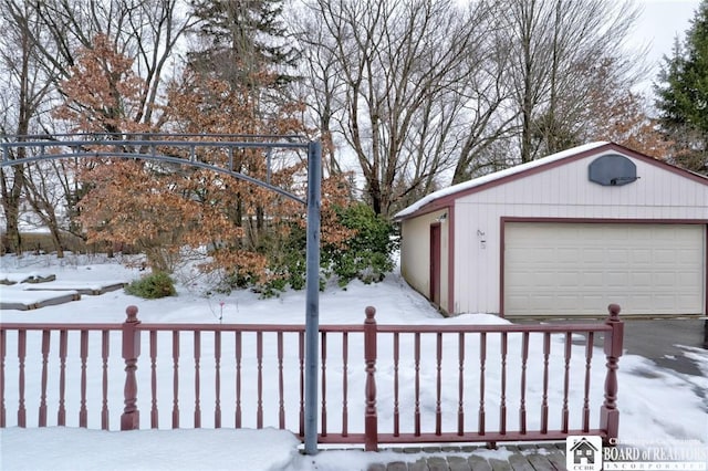 view of snow covered garage