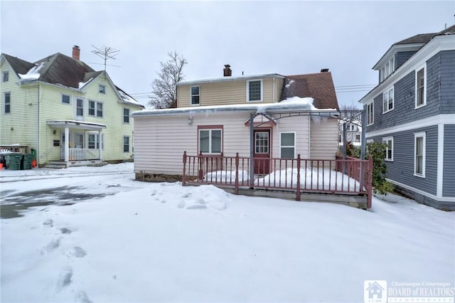 view of snow covered property