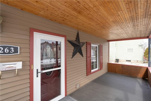 property entrance featuring covered porch