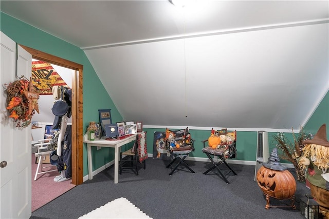 recreation room with carpet floors and vaulted ceiling