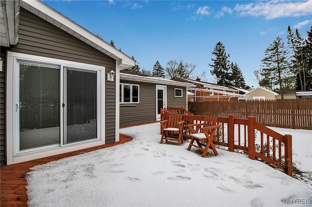 view of snow covered deck