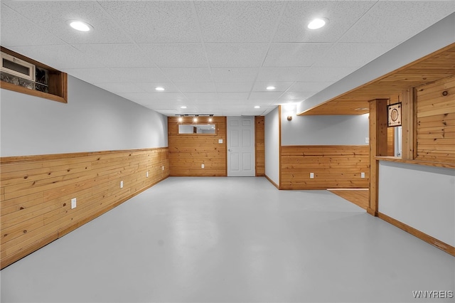 basement with wood walls