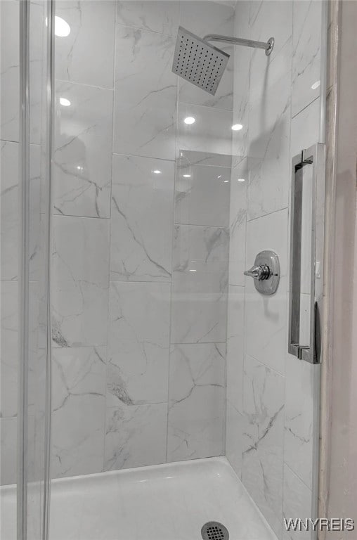 bathroom featuring walk in shower