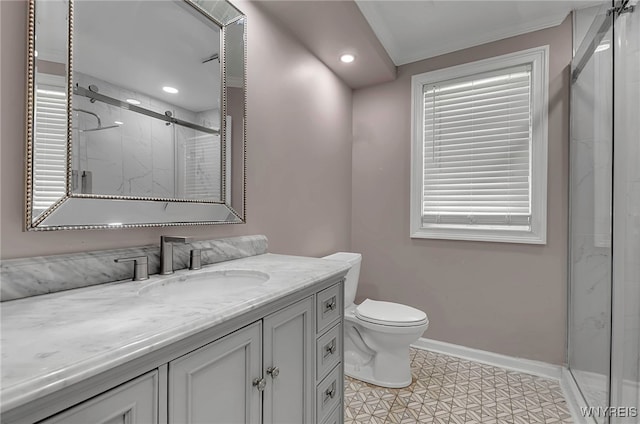 bathroom with crown molding, vanity, toilet, and a shower with shower door