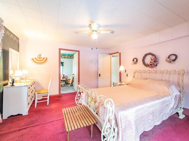 bedroom with ceiling fan and carpet