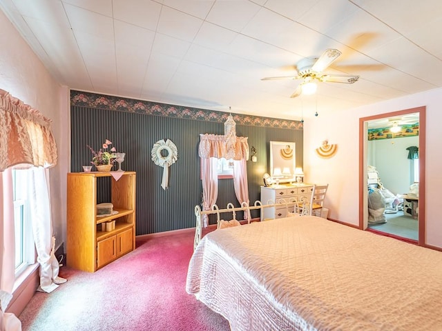 bedroom with ceiling fan and carpet floors