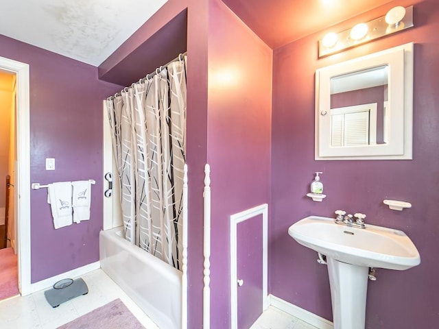 bathroom featuring tile patterned floors and shower / tub combo