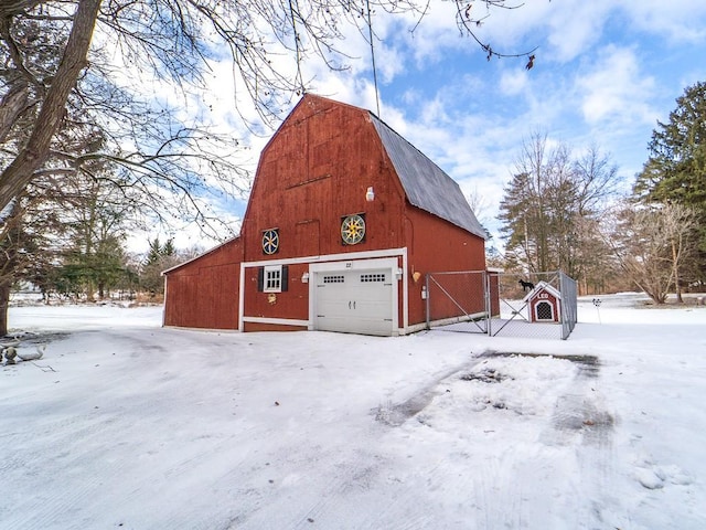 view of snow covered garage