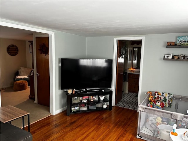 living room with dark hardwood / wood-style floors