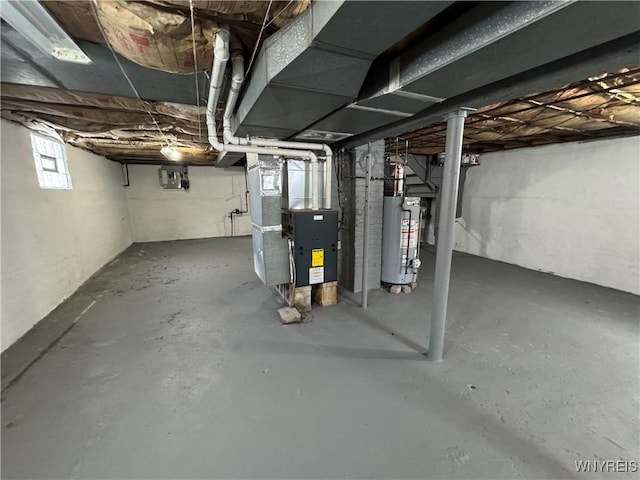 basement with heating unit and water heater