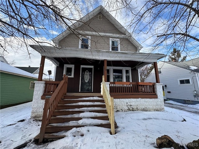 view of front of home featuring covered porch