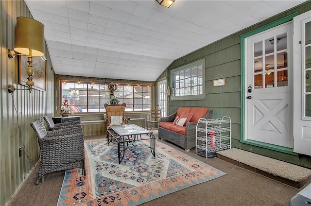 sunroom / solarium with vaulted ceiling