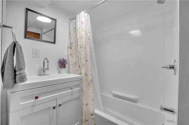 bathroom featuring shower / tub combo with curtain and vanity