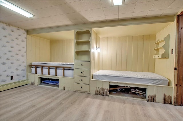 bedroom featuring hardwood / wood-style flooring