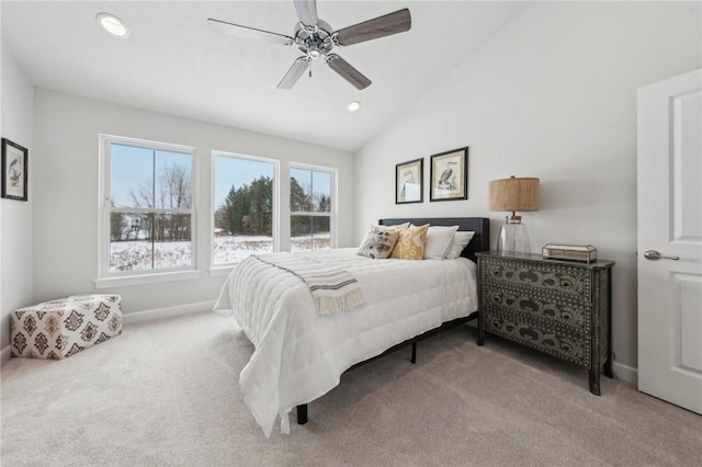 carpeted bedroom with lofted ceiling and ceiling fan