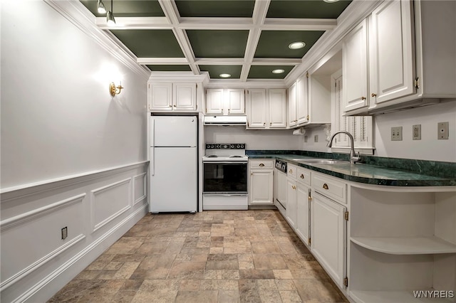 kitchen with white appliances, coffered ceiling, sink, and white cabinets