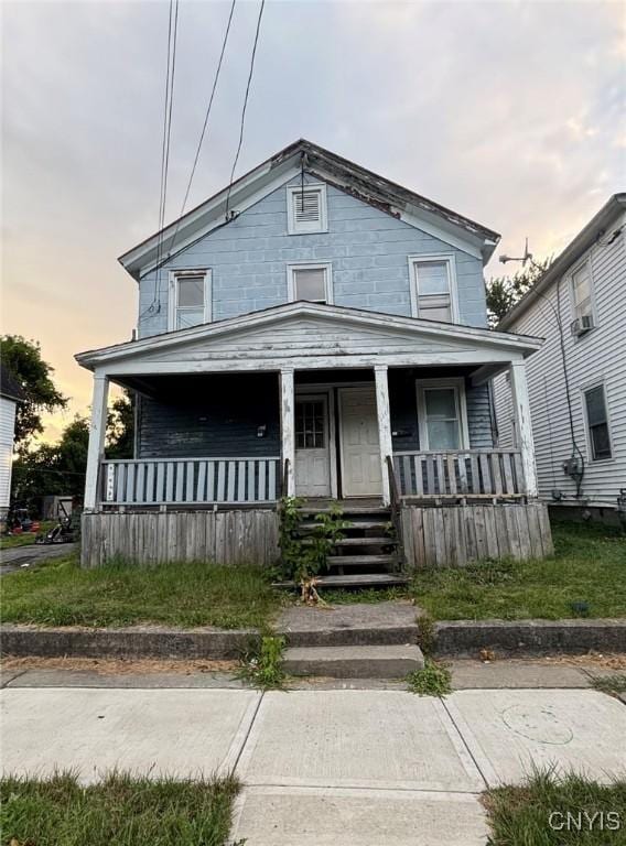 view of front of house with covered porch