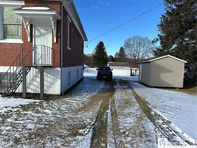 view of snow covered property