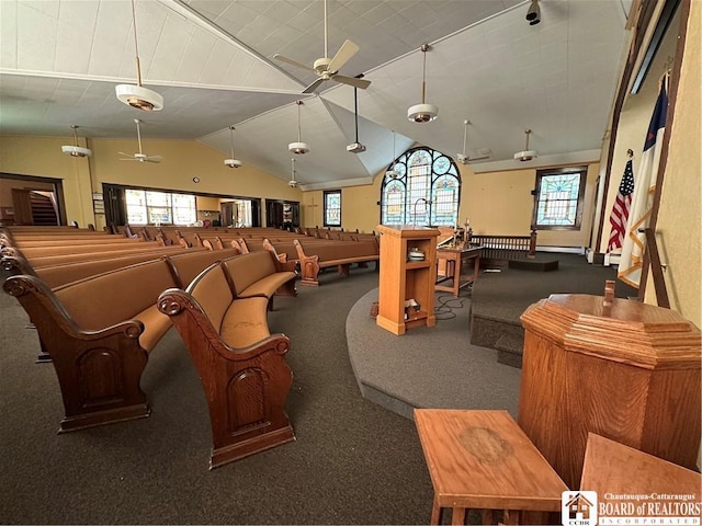 rec room featuring ceiling fan and vaulted ceiling