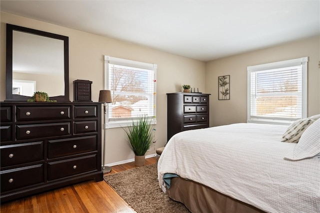 bedroom featuring wood-type flooring